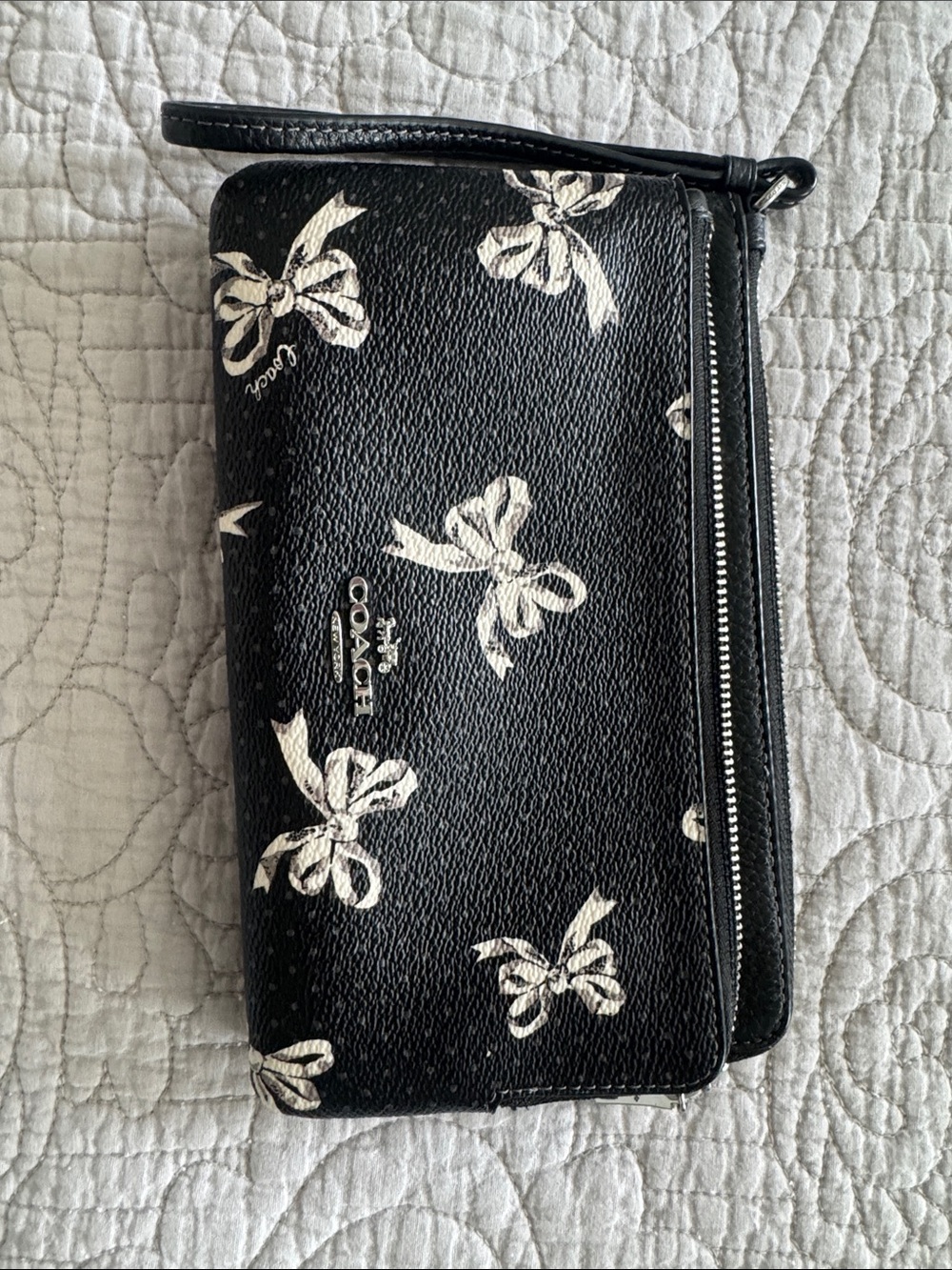 Coach Black Wristlet with White Bow Print